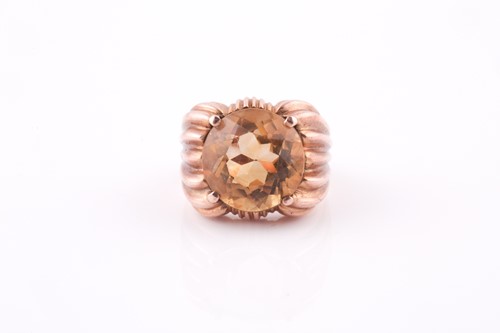 Lot 359 - A yellow metal and citrine mid-century ring,...