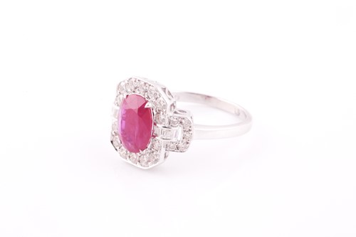 Lot 218 - An 18ct white gold, diamond, and ruby cocktail...