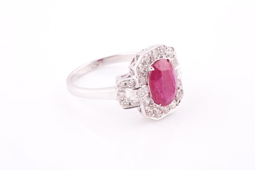 Lot 218 - An 18ct white gold, diamond, and ruby cocktail...