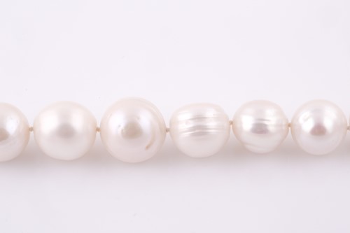 Lot 107 - A large freshwater pearl necklace, the pearls...