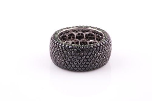 Lot 414 - An 18ct white gold, black diamond, and...