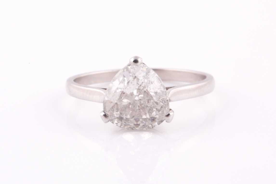 Lot 447 - A single stone diamond ring, set with a...