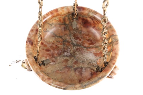 Lot 134 - An early 20th-century onyx plaffionier, with...