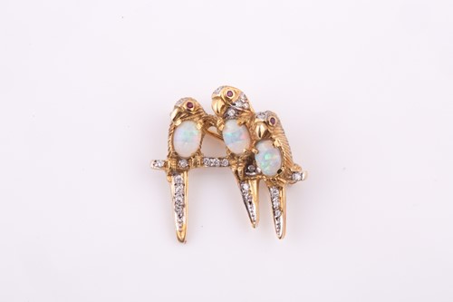 Lot 89 - A diamond and opal brooch in the form of three...
