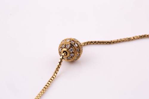 Lot 30 - A diamond pavé set spherical pendant necklace,...