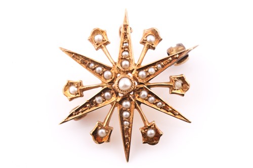 Lot 552 - A 15ct yellow gold and split seed pearl...