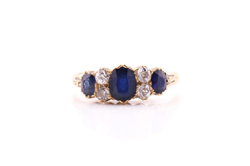 Lot 402 - A yellow metal, sapphire and diamond ring, set...