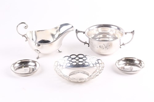 Lot 567 - Four small items of silver, comprising a...