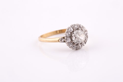 Lot 350 - A yellow metal and diamond cluster ring, set...