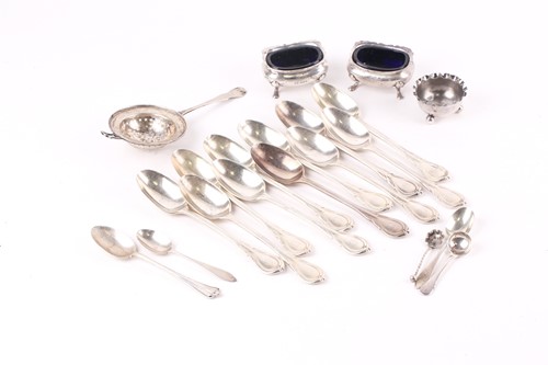 Lot 542 - A set of eleven late Victorian silver "Lotus...