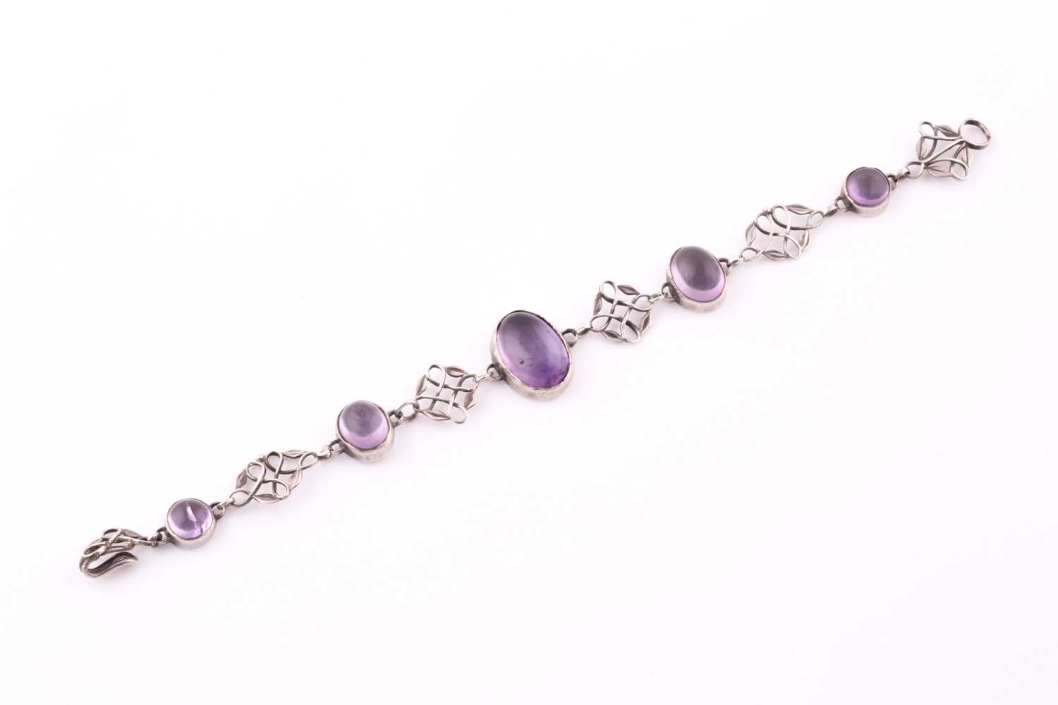 Lot 265 - An Arts & Crafts silver and amethyst bracelet...