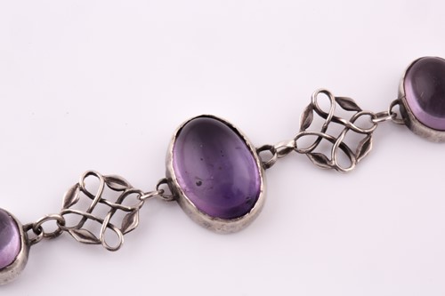 Lot 265 - An Arts & Crafts silver and amethyst bracelet...