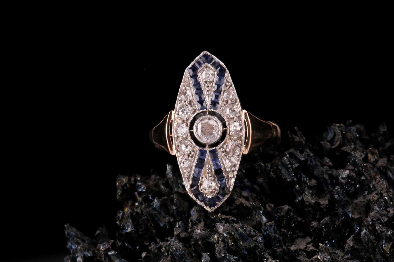Lot 324 - A diamond and sapphire lozenge-shaped panel