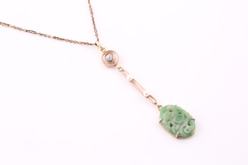 Lot 235 - A carved jade, diamond and seed pearl pendant,...