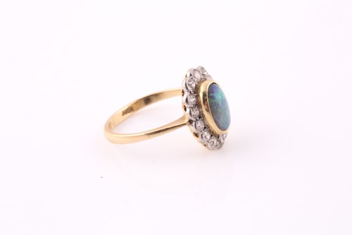 Lot 94 - An opal and diamond cluster ring, opal...
