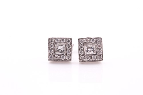 Lot 215 - A pair of 18ct white gold and diamond square...