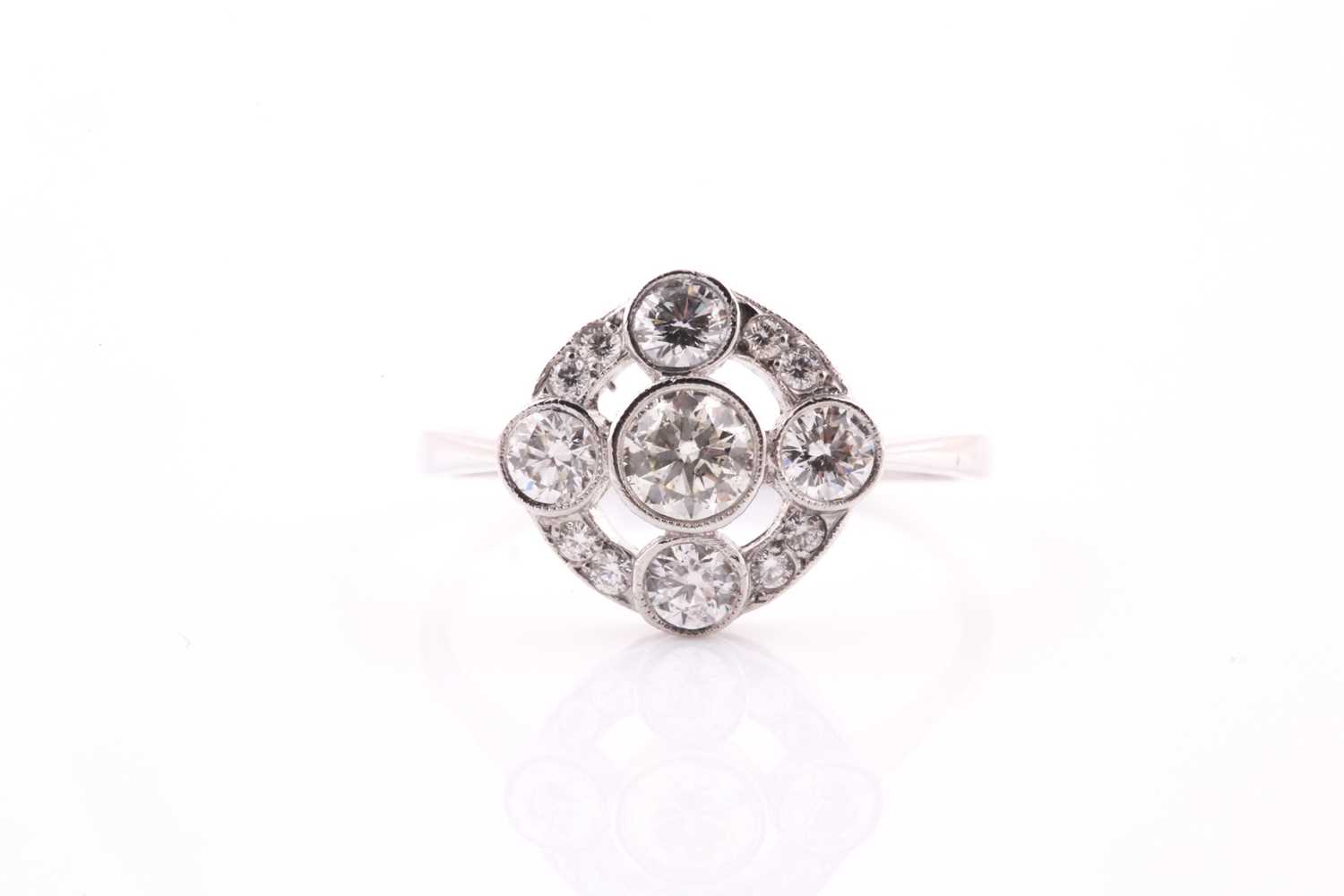 Lot 300 - A platinum and diamond cluster ring,set with...
