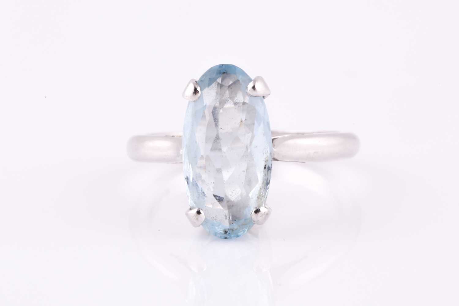 Lot 230 - 18ct white gold and aquamarine ring, four claw...