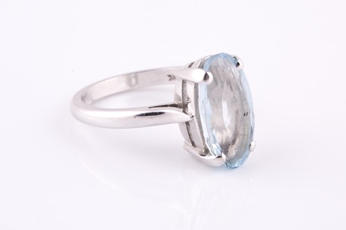Lot 230 - 18ct white gold and aquamarine ring, four claw...