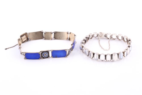Lot 90 - A silver and moonstone bracelet, set with oval...