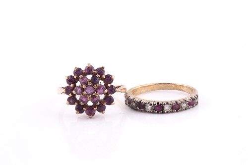 Lot 389 - A 9ct yellow gold and ruby cluster ring, size...
