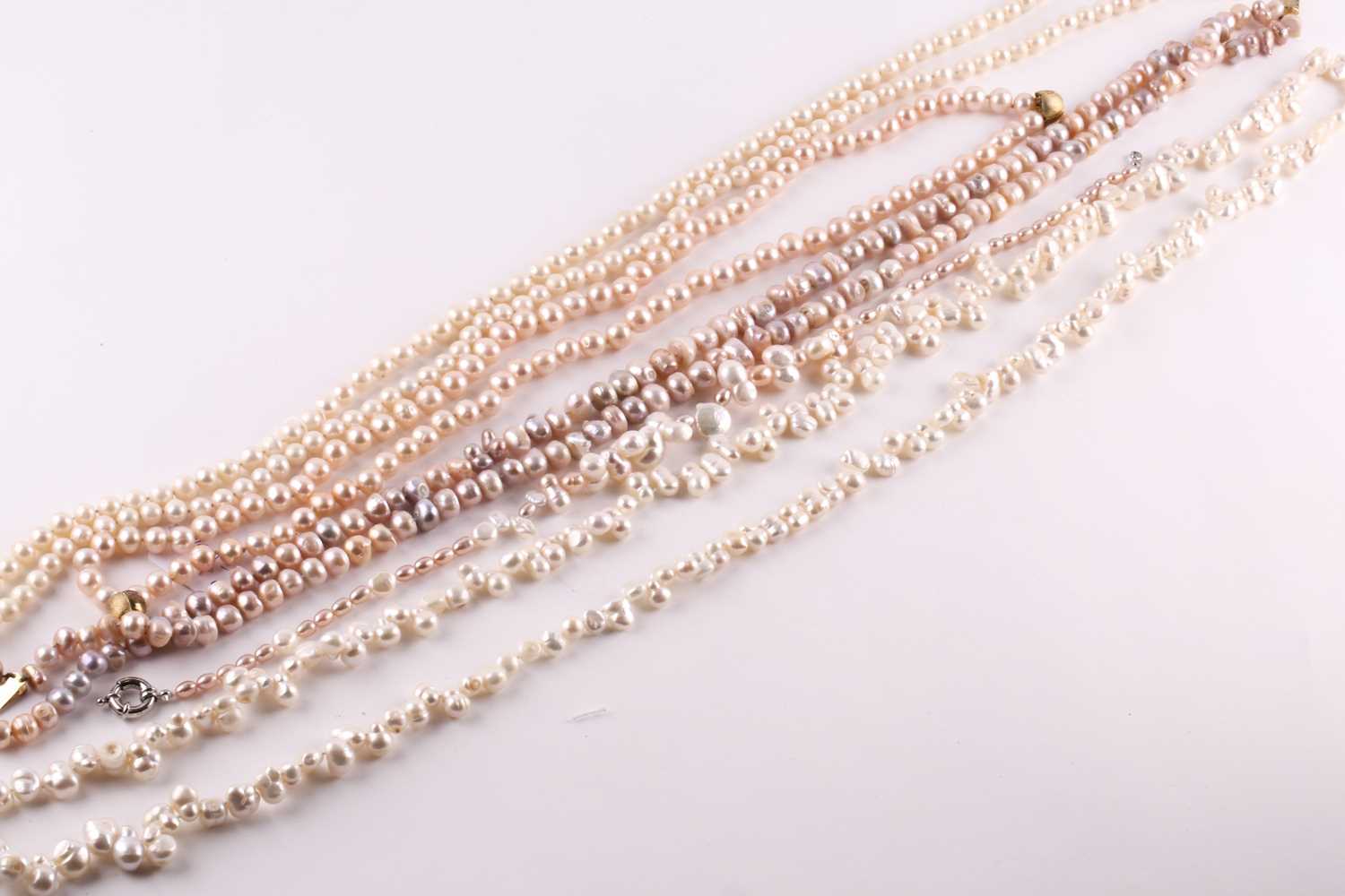 Lot 159 - A freshwater baroque pearl necklace, 124cm...