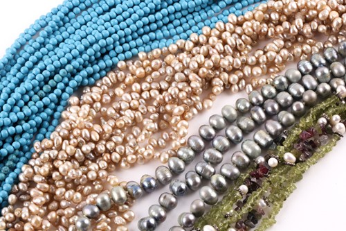 Lot 193 - A multi-strand turquoise colour bead necklace...