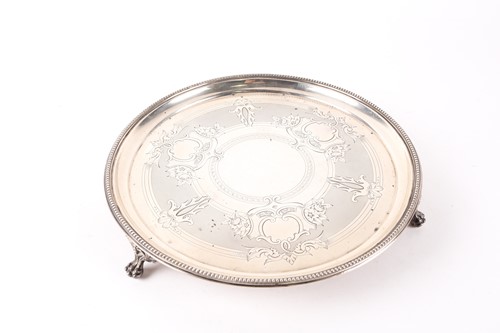 Lot 572 - A Victorian circular silver waiter. London...