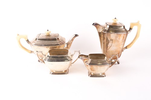 Lot 569 - An Art Deco silver four-piece tea set....