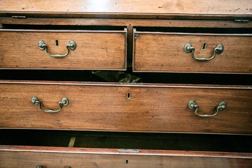 Lot 111 - A George III mahogany bureau bookcase. The...