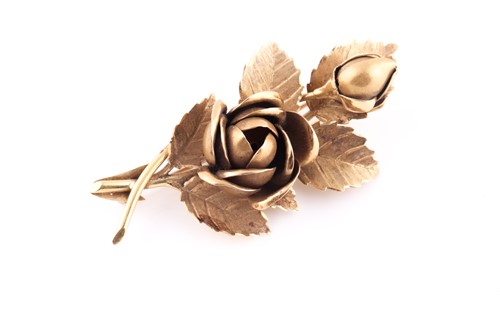 Lot 10 - An 18ct yellow gold floral spray brooch, in...