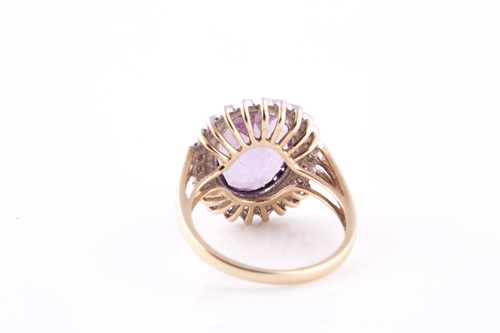 Lot 150 - A 9ct yellow gold, amethyst, and diamond...