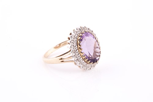 Lot 150 - A 9ct yellow gold, amethyst, and diamond...