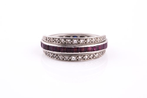 Lot 390 - A diamond, sapphire, and ruby hinged eternity...