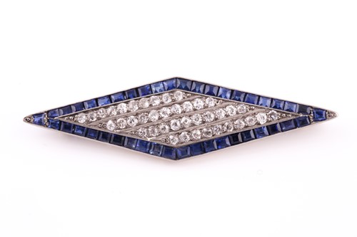 Lot 420 - A diamond and sapphire kite-shaped brooch, set...