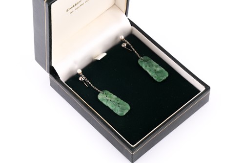 Lot 182 - A pair of 18ct white gold and jade drop...