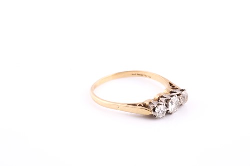 Lot 38 - An 18ct yellow gold and diamond ring, set with...
