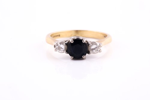 Lot 494 - An 18ct yellow gold, diamond, and sapphire...