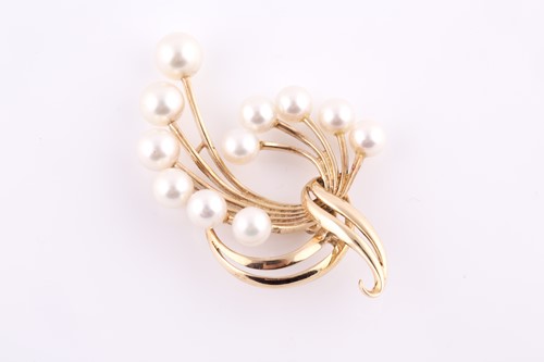 Lot 367 - A 14k yellow gold and pearl spray brooch, set...