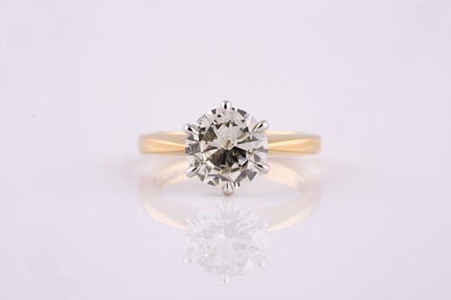 Lot 346A - A solitaire diamond ring, set with a round...