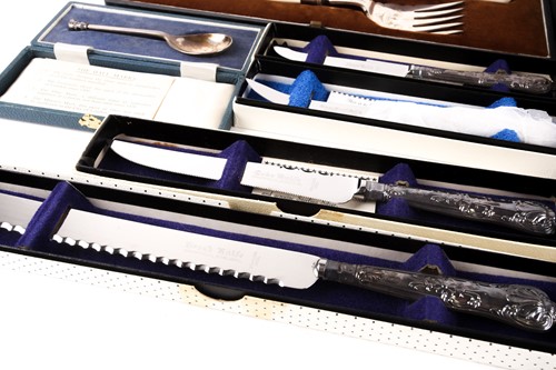 Lot 526 - A cased pair of 1930s silver bladed fish...