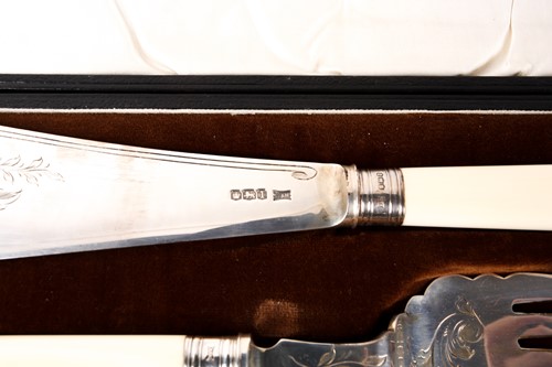 Lot 526 - A cased pair of 1930s silver bladed fish...