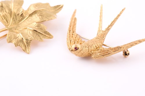 Lot 463 - A gold brooch by Garrard & Co. and a gold...