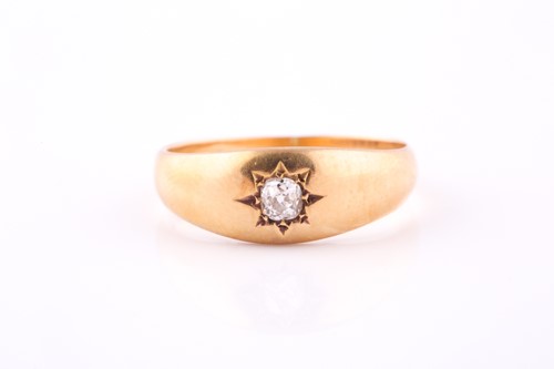 Lot 584 - A diamond single-stone ring The 18ct yellow...