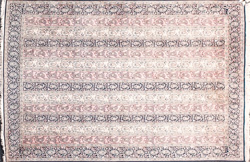 Lot 195 - A Kashmiri silk carpet with striped boteh...