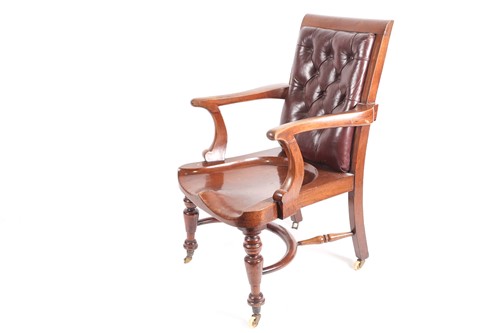 Lot 215 - A late Victorian mahogany desk chair with...