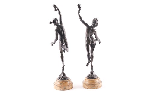 Lot 209 - A pair of 19th century patinated bronze...