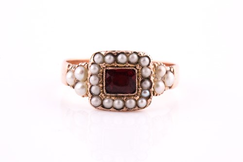 Lot 707 - A mid-19th century garnet and split pearl...