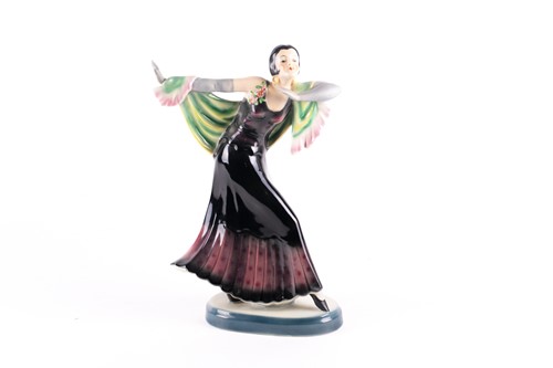 Lot 340 - A mid-20th century ceramic figure of a dancer,...