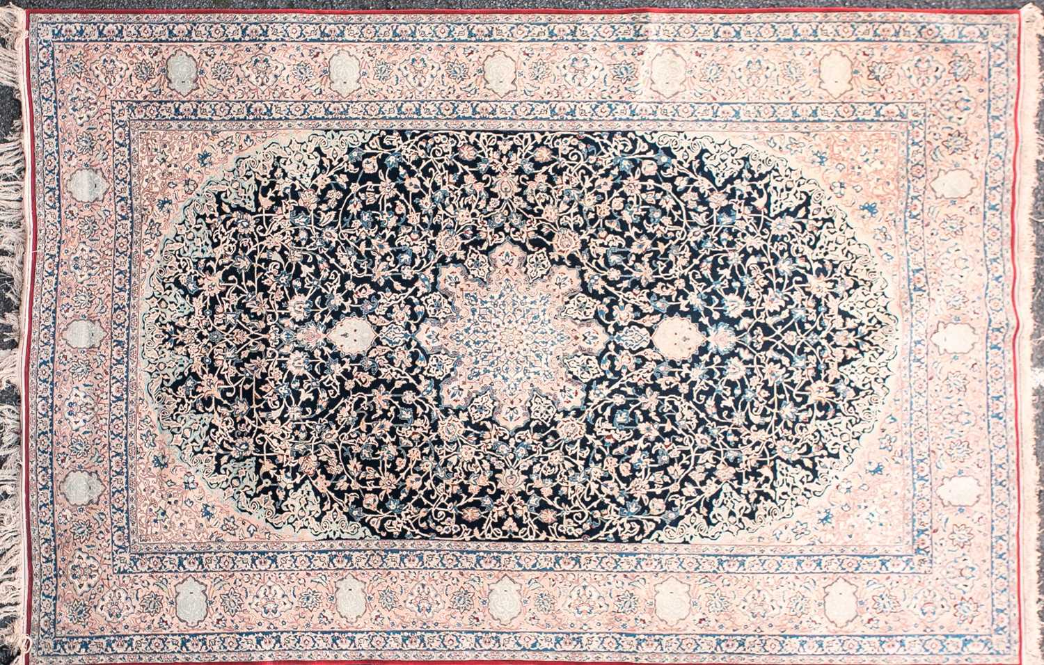 Lot 186 - A 20th-century dark blue ground Kashan carpet...